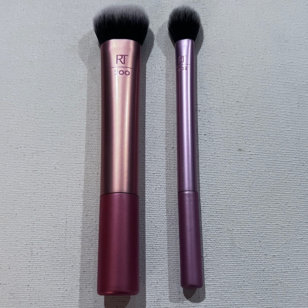 (2) Real Techniques brushes. Expert face and Setting. Both like new. Full size
